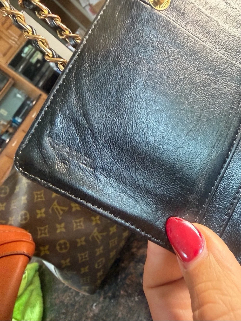 CHANEL Black Quilted Camellia Leather Crossbody with Gold Hardware & Tassel